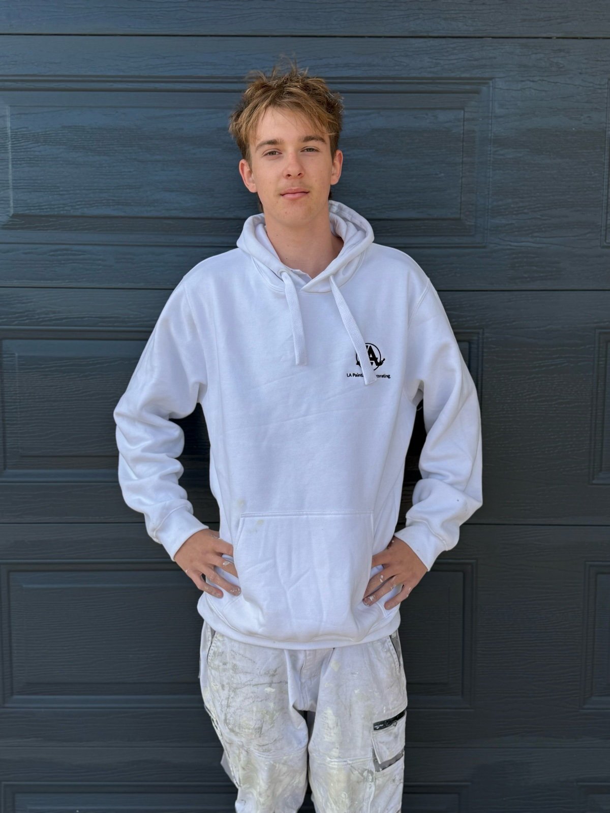 Decklan, first year apprentice at LA Painting & Decorating, in branded uniform in Perth