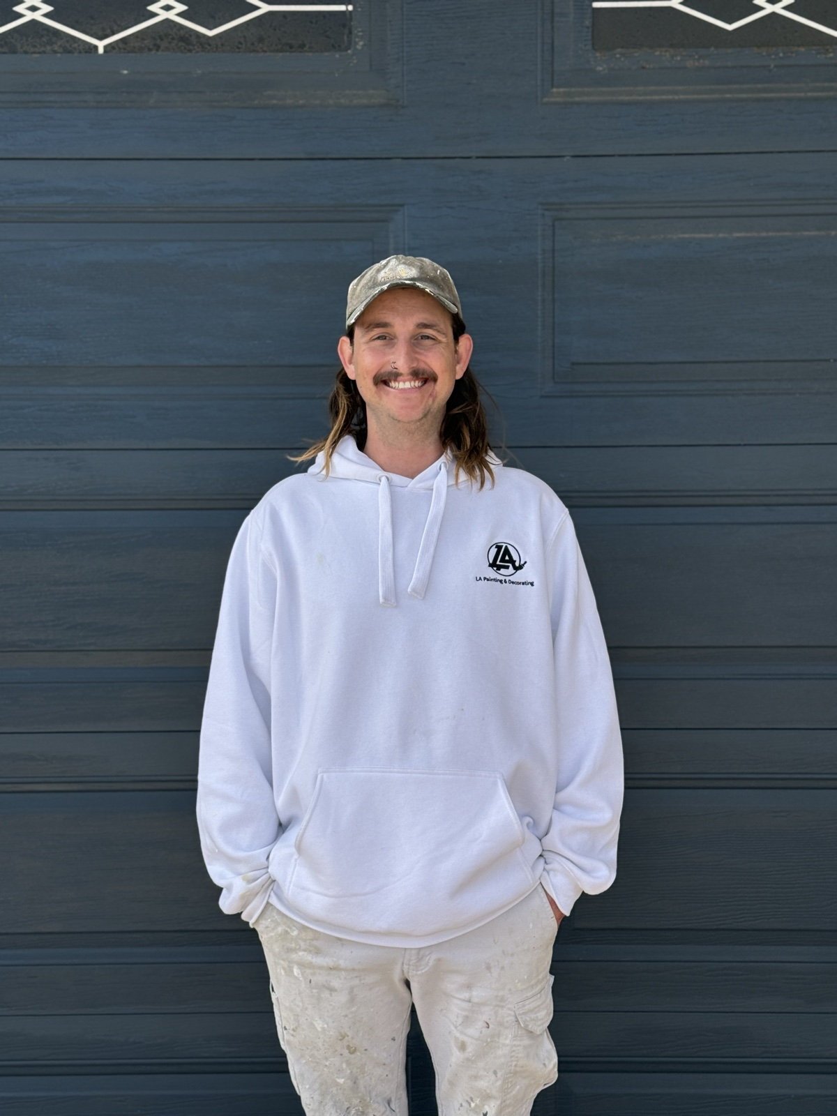 Patrick, Site Supervisor at LA Painting & Decorating, in branded uniform in Perth