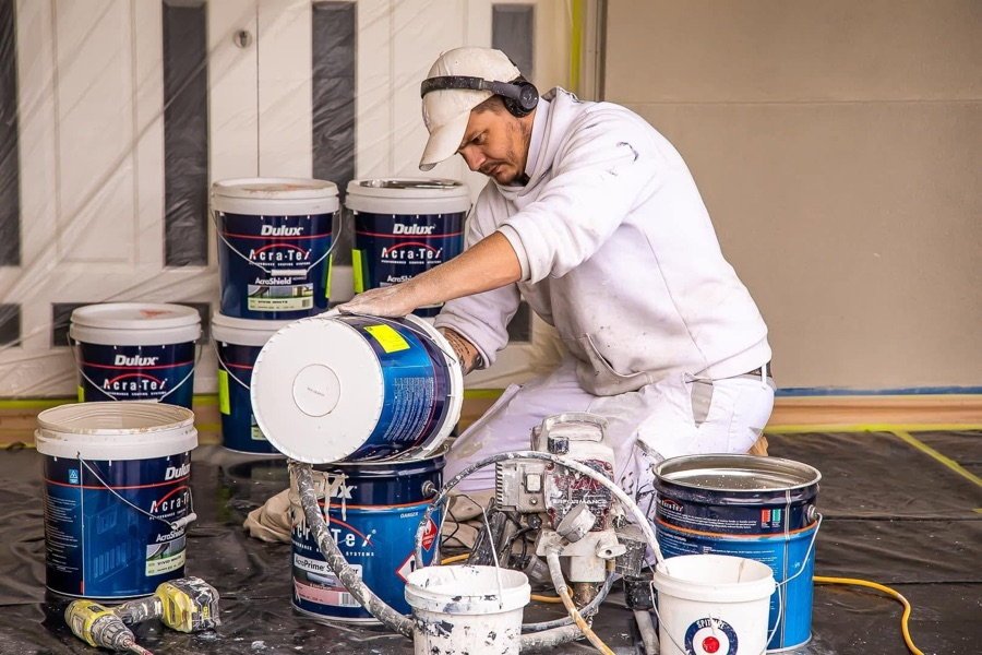 Luke from LA Painting & Decorating on site with Dulux AcraTex systems