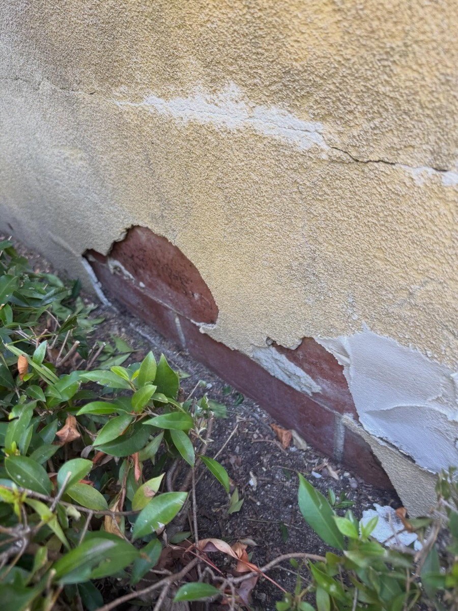 Common render damage repaired by LA Painting in Perth